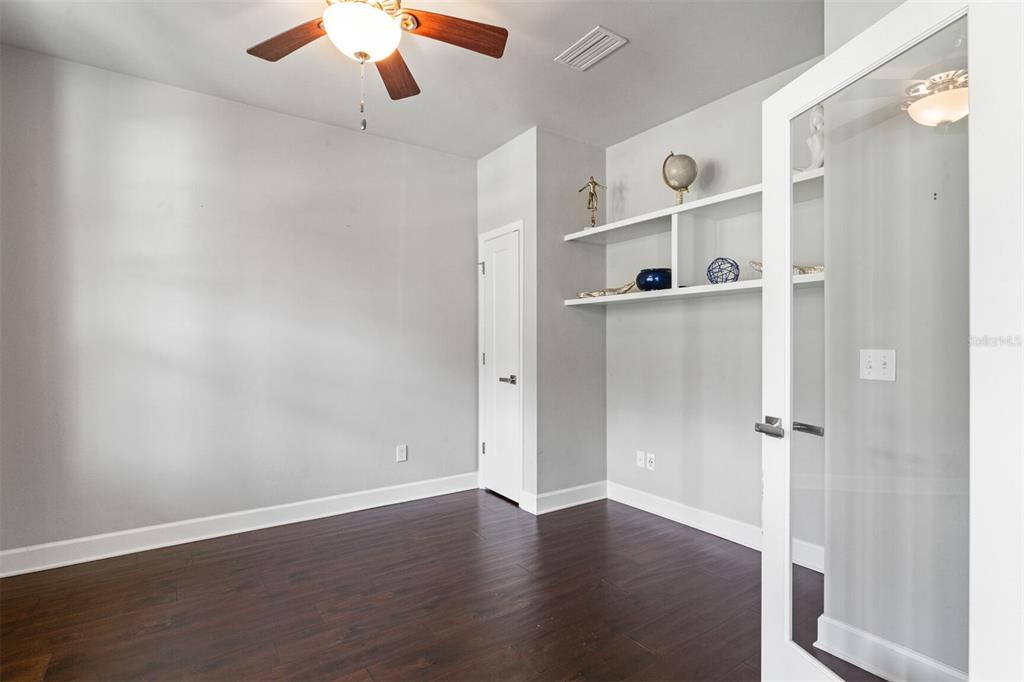 4855 Southwest 64th Road Gainesville, FL 32608 - Photo 7 of 44 wooden floor in an empty room