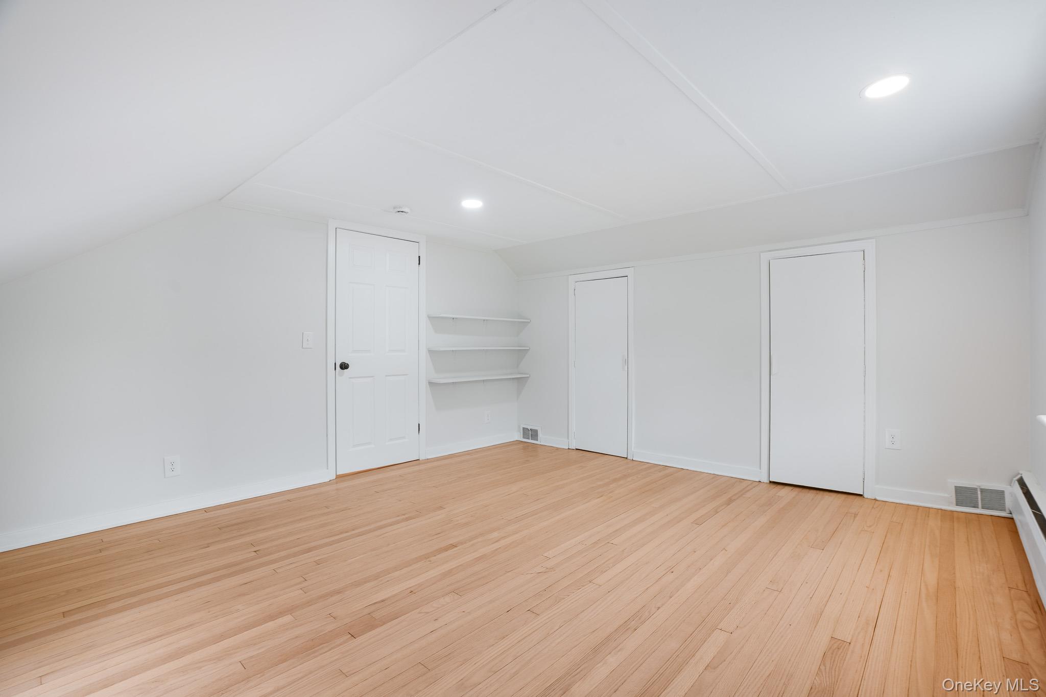 3 Pond Road Hyde Park, NY 12601 - Photo 17 of 34 a view of empty room with wooden floor