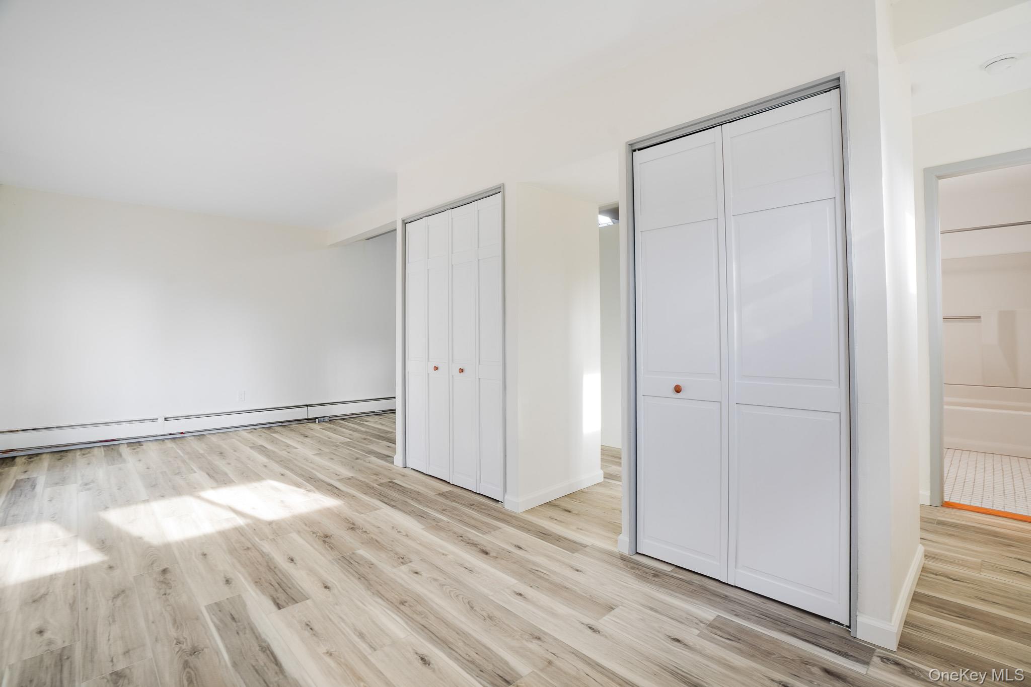 3 Pond Road Hyde Park, NY 12601 - Photo 25 of 34 a view of empty room with wooden floor