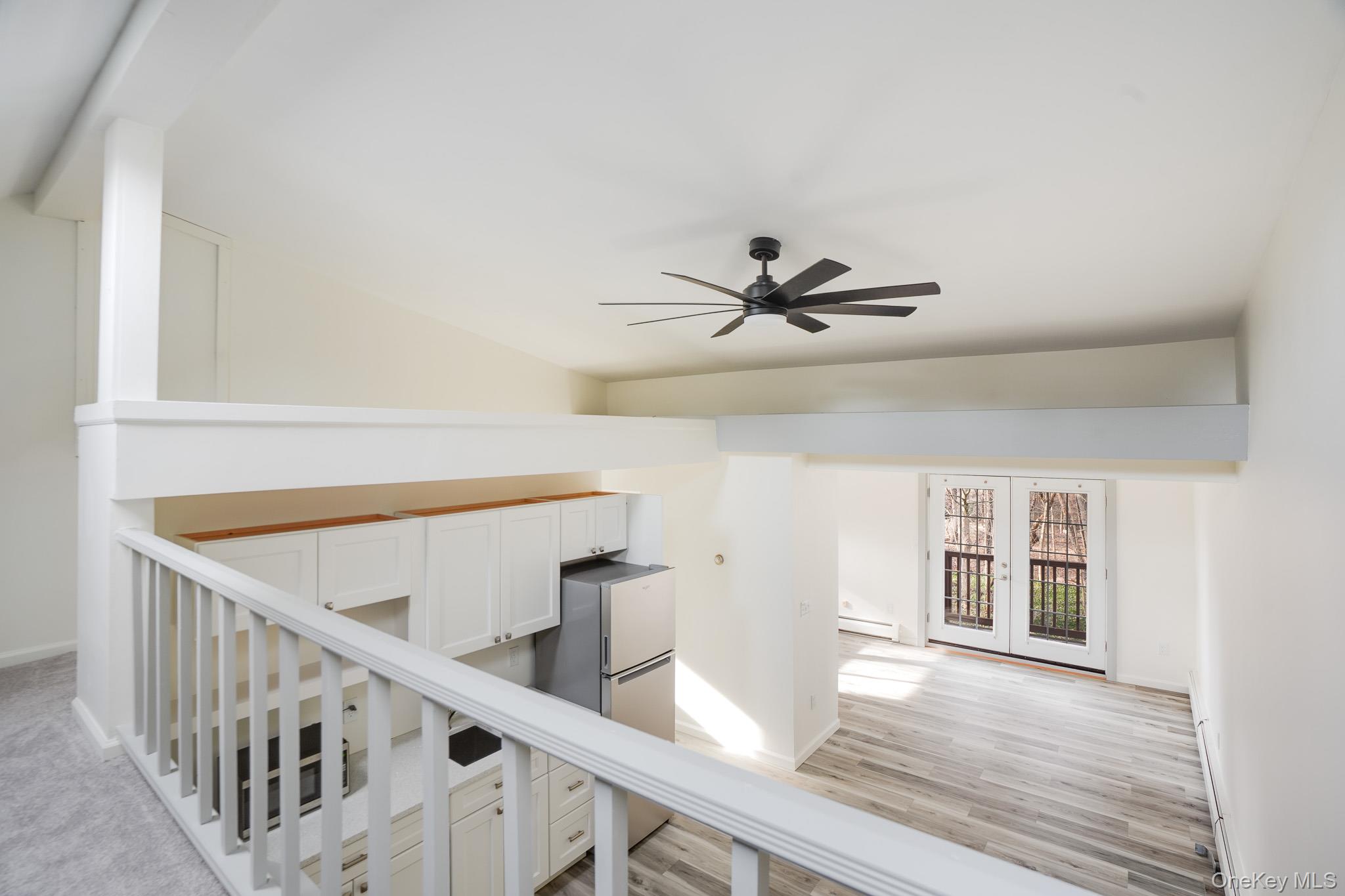 3 Pond Road Hyde Park, NY 12601 - Photo 28 of 34 a view of a hallway with wooden floor and windows