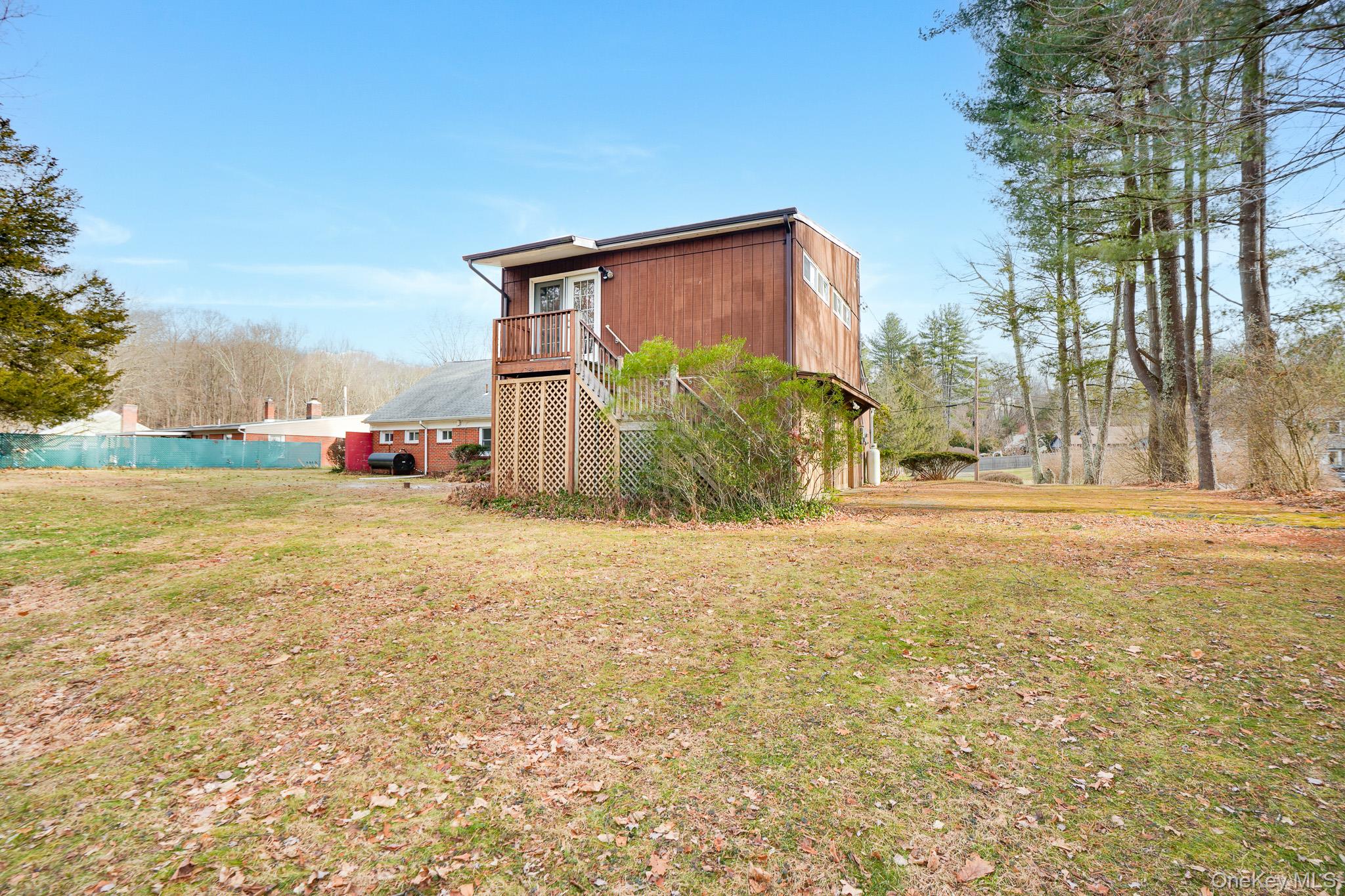 3 Pond Road Hyde Park, NY 12601 - Photo 32 of 34 a view of a house with backyard and trees