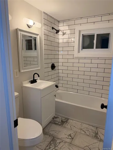 a kitchen with stainless steel appliances a refrigerator sink and cabinets