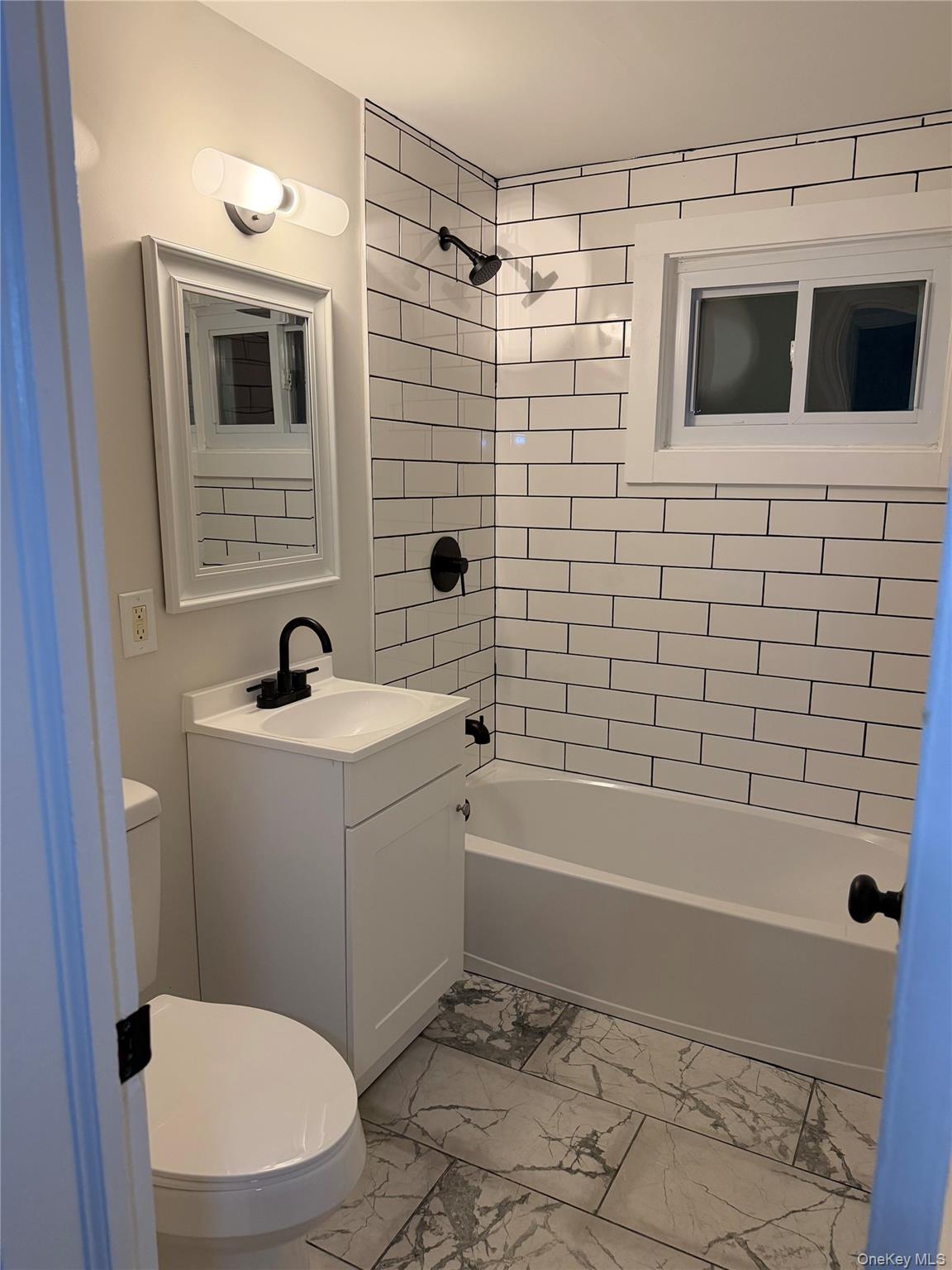 3 Pond Road Hyde Park, NY 12601 - Photo 9 of 34 a bathroom with a toilet a sink and bathtub