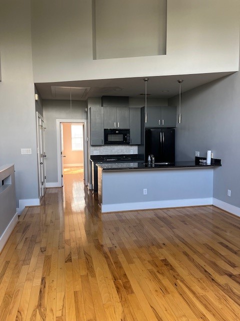 1045 Bonner Street Houston, TX 77007 - Photo 11 of 17 a view of a kitchen with a sink and a stove