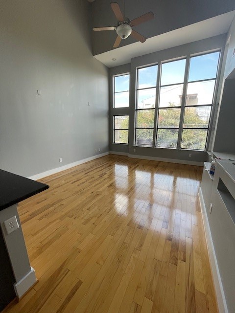1045 Bonner Street Houston, TX 77007 - Photo 9 of 17 a view of empty room with wooden floor and fan
