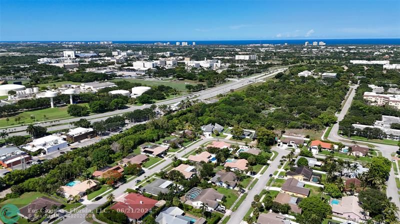 1224 Northwest 15th Street Boca Raton, FL 33486 - Photo 3 of 20 an aerial view of residential houses with outdoor space and trees