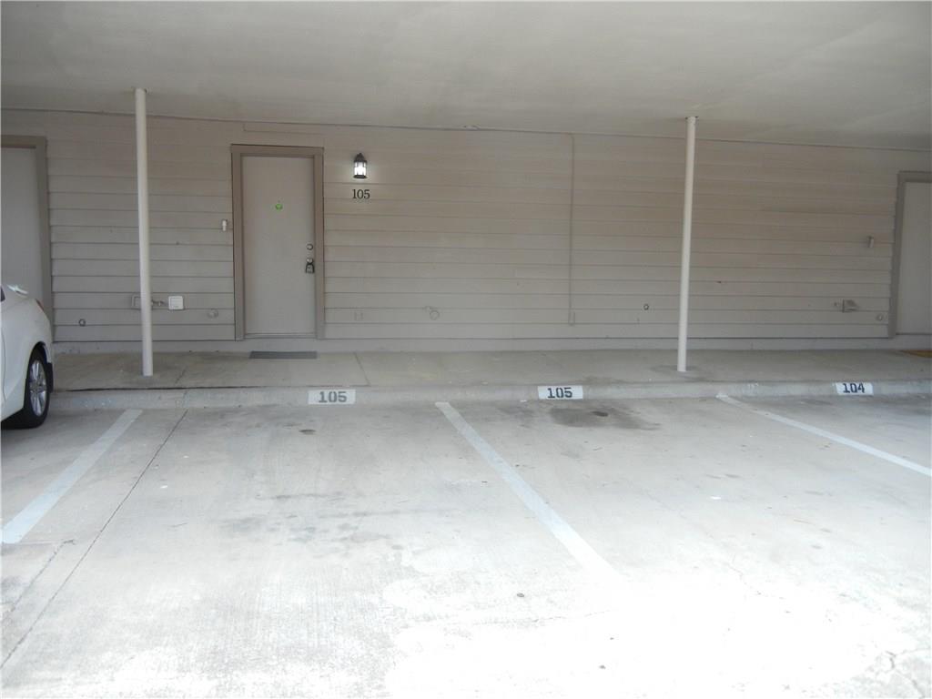 18240 Midway Road, Unit 105 Dallas, TX 75287 - Photo 31 of 37 a view of a room with a bench