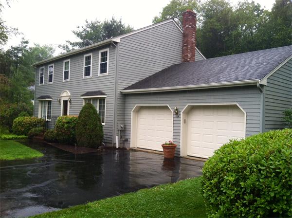 129 Hampton Road Sharon, MA 02067 - Photo 1 of 10 a front view of a house with garden