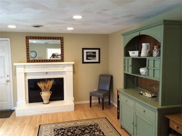 129 Hampton Road Sharon, MA 02067 - Photo 4 of 10 a living room with furniture and a fireplace