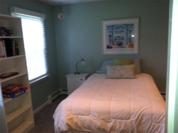 129 Hampton Road Sharon, MA 02067 - Photo 7 of 10 a bedroom with a bed and a window