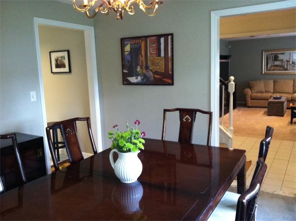 129 Hampton Road Sharon, MA 02067 - Photo 8 of 10 a view of a dining room with furniture and wooden floor