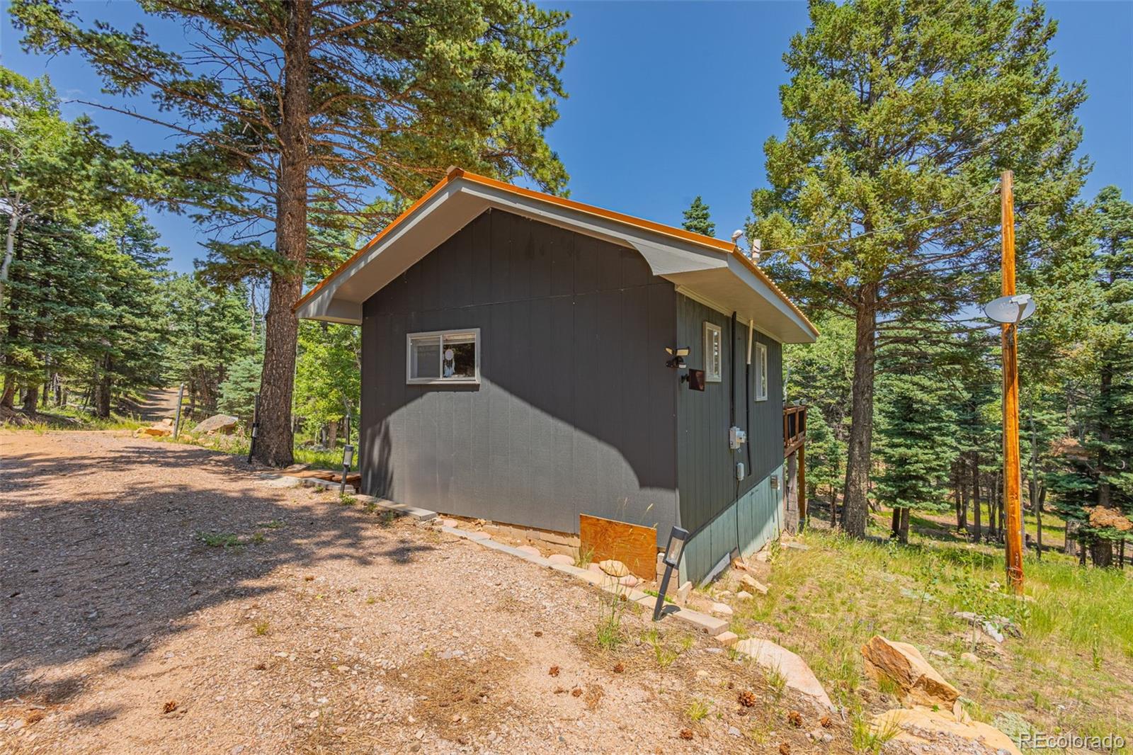 9796 Highway 165 Rye, CO 81069 - Photo 19 of 24 a view of a house with a yard