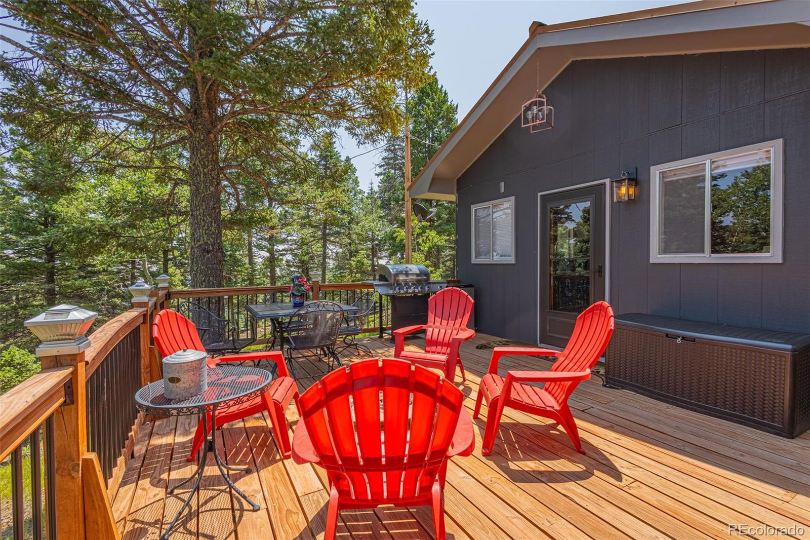 9796 Highway 165 Rye, CO 81069 - Photo 4 of 24 a backyard of a house with table and chairs