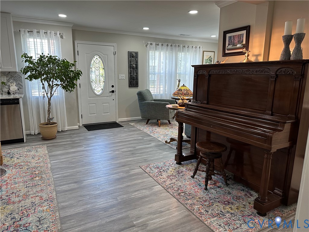 305 Myrtle Street, Unit A Ashland, VA 23005 - Photo 16 of 59 a living room with furniture and a piano