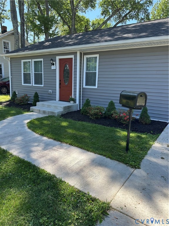 305 Myrtle Street, Unit A Ashland, VA 23005 - Photo 2 of 59 a front view of a house with garden