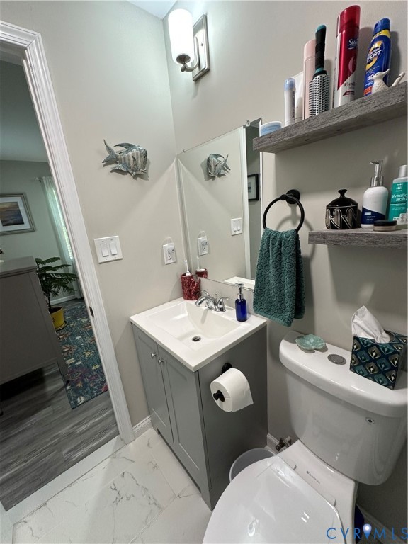 305 Myrtle Street, Unit A Ashland, VA 23005 - Photo 22 of 59 a bathroom with a sink toilet and shower