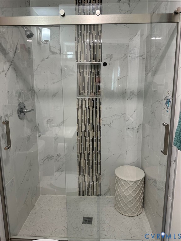 305 Myrtle Street, Unit A Ashland, VA 23005 - Photo 23 of 59 a bathroom with a shower