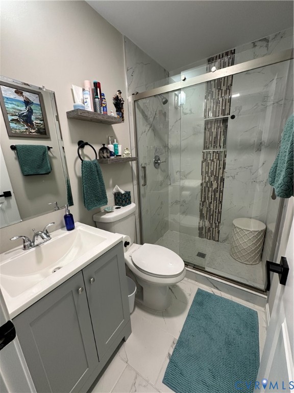 305 Myrtle Street, Unit A Ashland, VA 23005 - Photo 24 of 59 a bathroom with a sink toilet and shower