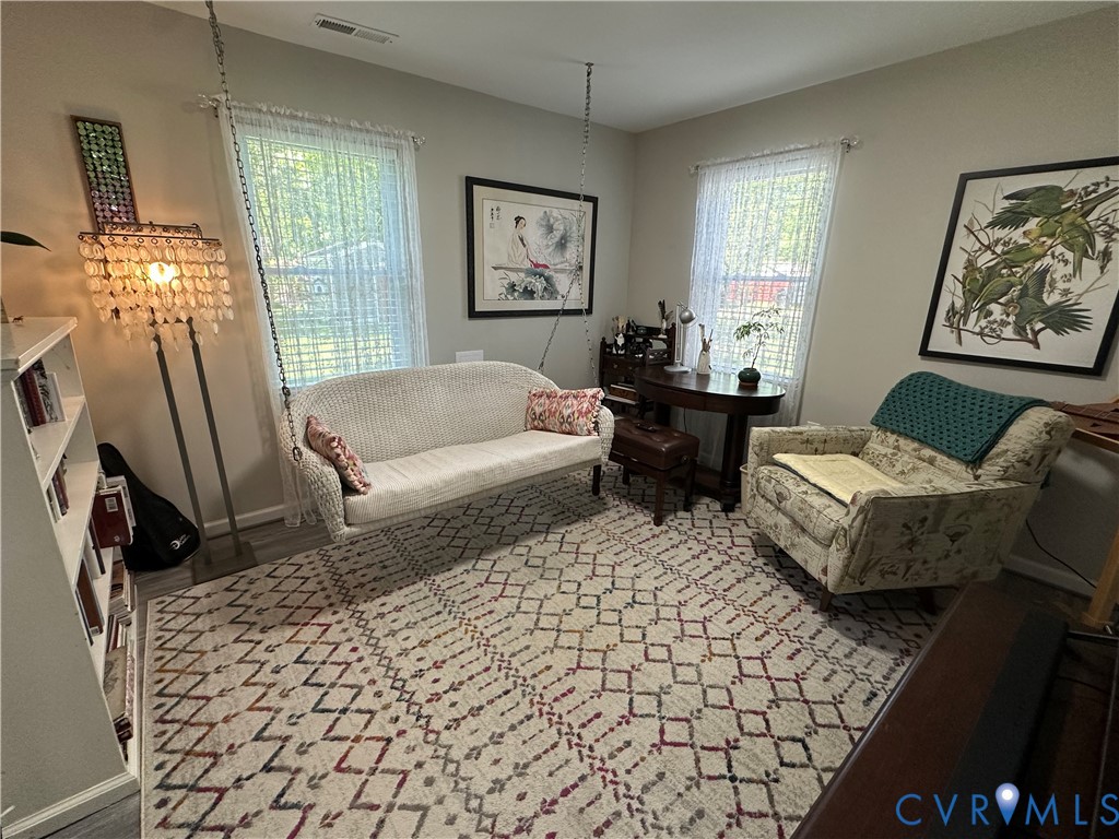 305 Myrtle Street, Unit A Ashland, VA 23005 - Photo 26 of 59 a living room with furniture and a window