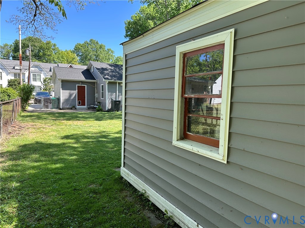 305 Myrtle Street, Unit A Ashland, VA 23005 - Photo 42 of 59 a view of a house with a backyard