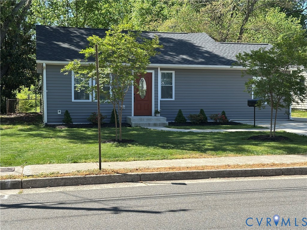 305 Myrtle Street, Unit A Ashland, VA 23005 - Photo 53 of 59 a view of a house with a yard