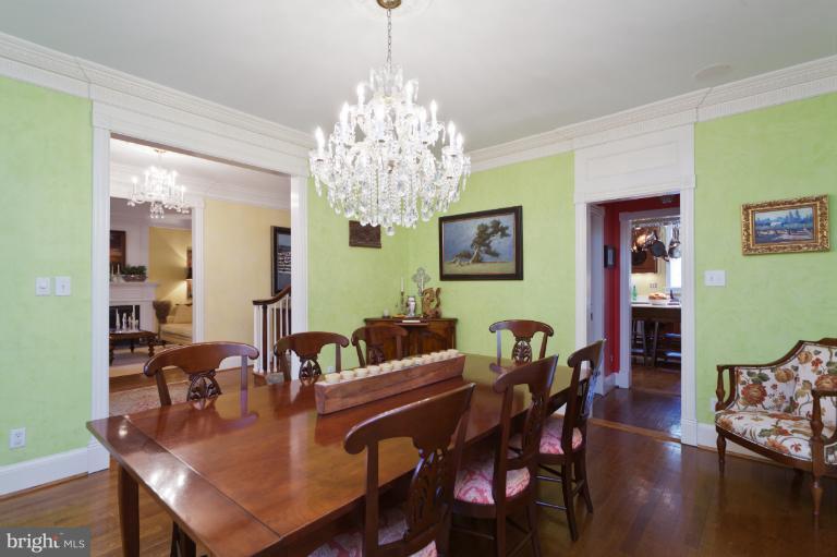 2012 South Arlington Ridge Road Arlington, VA 22202 - Photo 12 of 30 a view of a dining room with furniture and wooden floor
