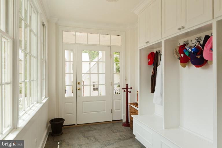 2012 South Arlington Ridge Road Arlington, VA 22202 - Photo 23 of 30 a view of an entryway with wooden floor and windows