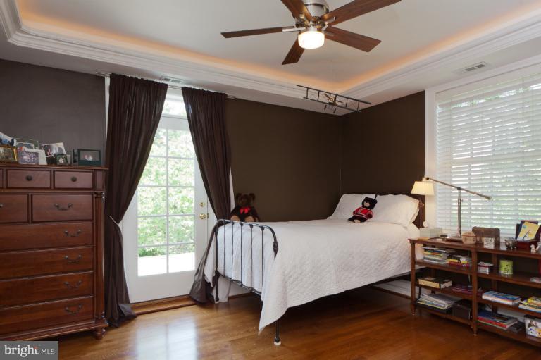 2012 South Arlington Ridge Road Arlington, VA 22202 - Photo 25 of 30 a bedroom with a bed and a window