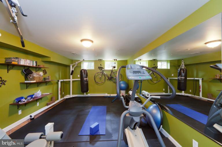 2012 South Arlington Ridge Road Arlington, VA 22202 - Photo 8 of 30 a room with lots of gym equipment