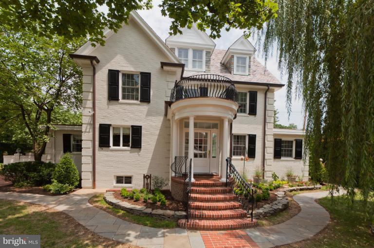 2012 South Arlington Ridge Road Arlington, VA 22202 - Photo 10 of 30 a front view of a house with a yard
