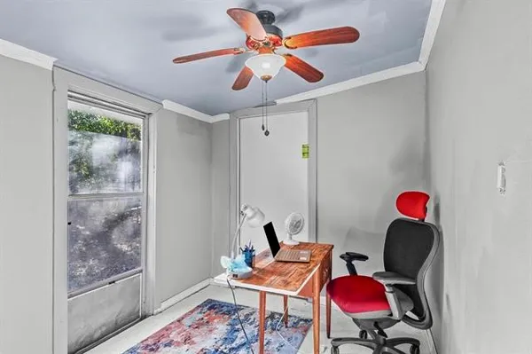 a room with furniture and a window