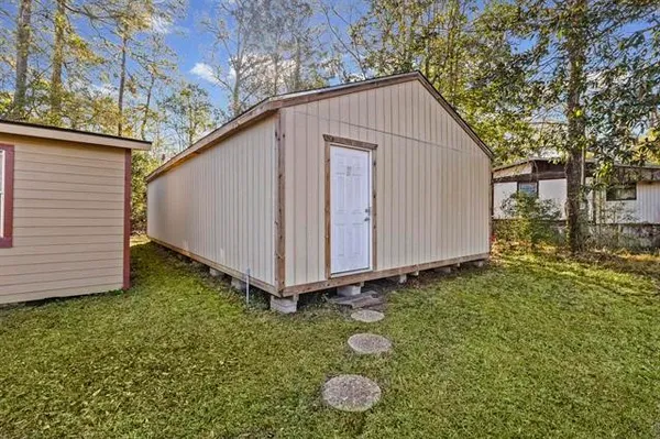 a house view with a backyard space