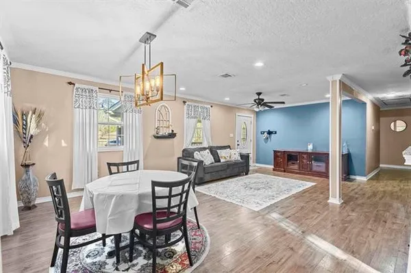a view of a dining room with furniture