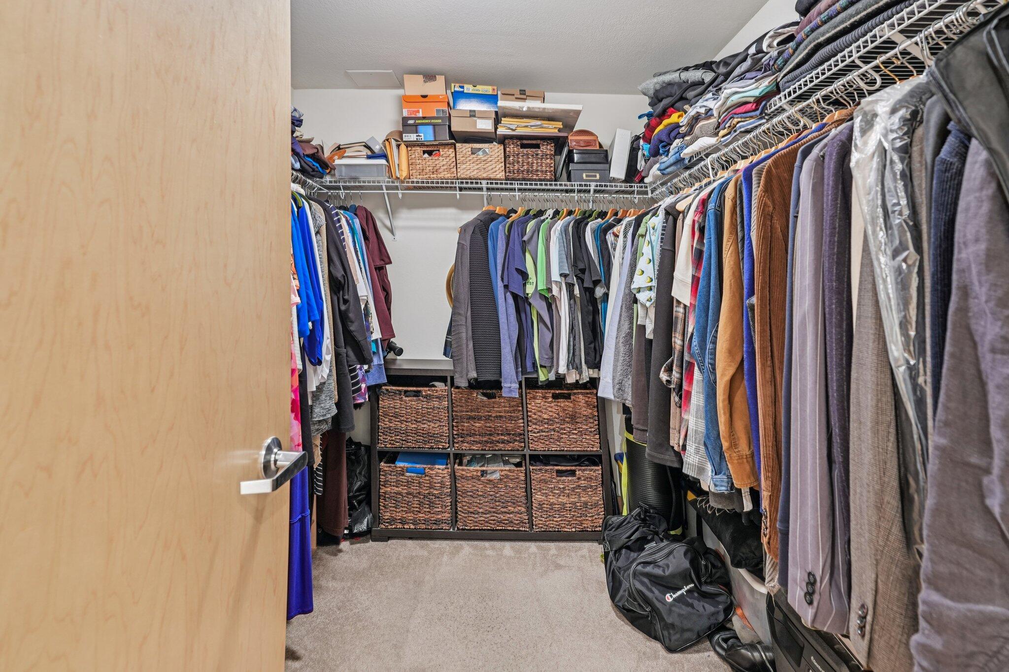 106 West Seeboth Street, Unit 908 Milwaukee, WI 53204 - Photo 25 of 48 Walk-in closet attached to the Primary bedroom