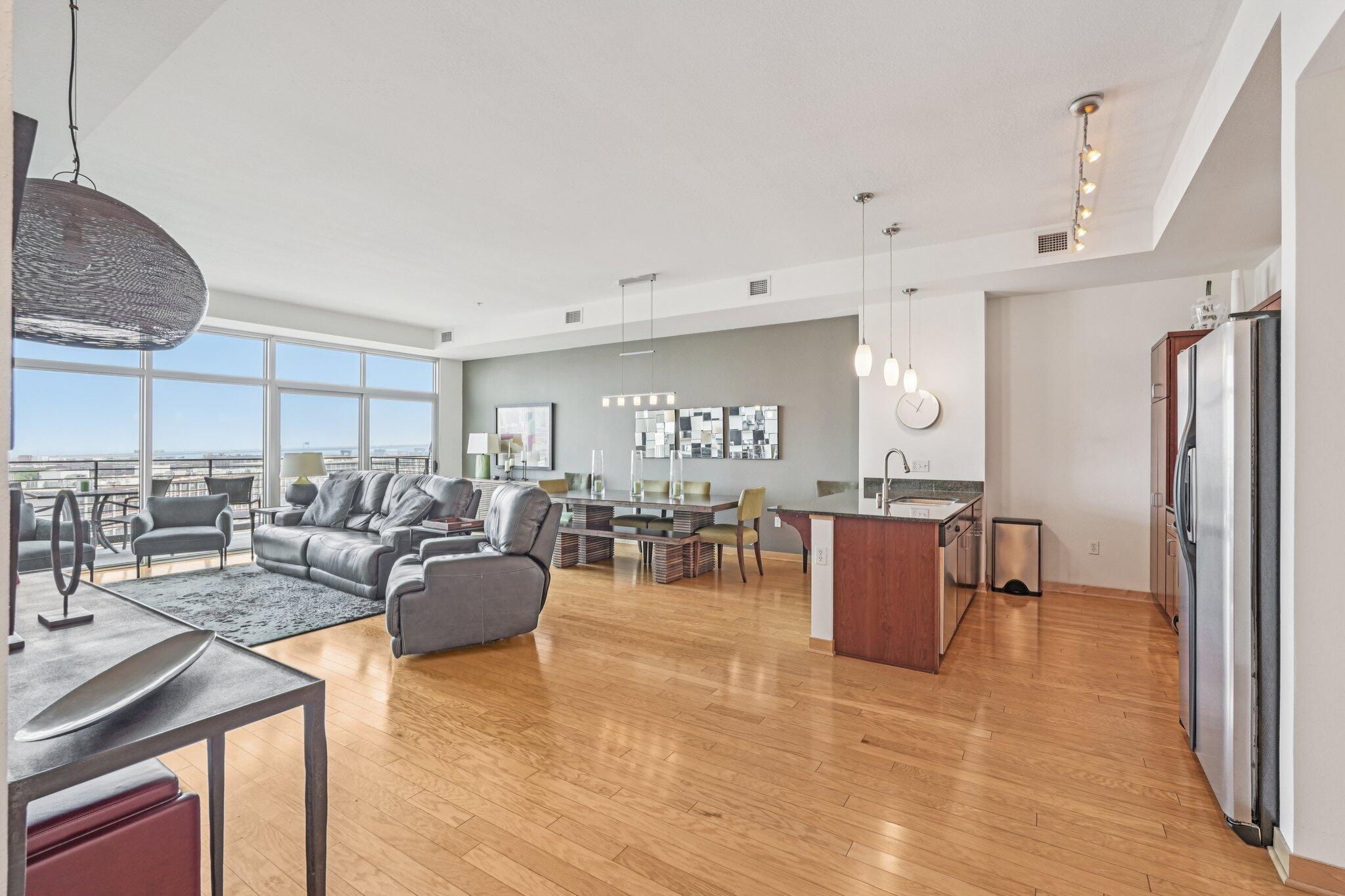 106 West Seeboth Street, Unit 908 Milwaukee, WI 53204 - Photo 3 of 46 Breathtaking open concept kitchen and living room attached to your private balcony