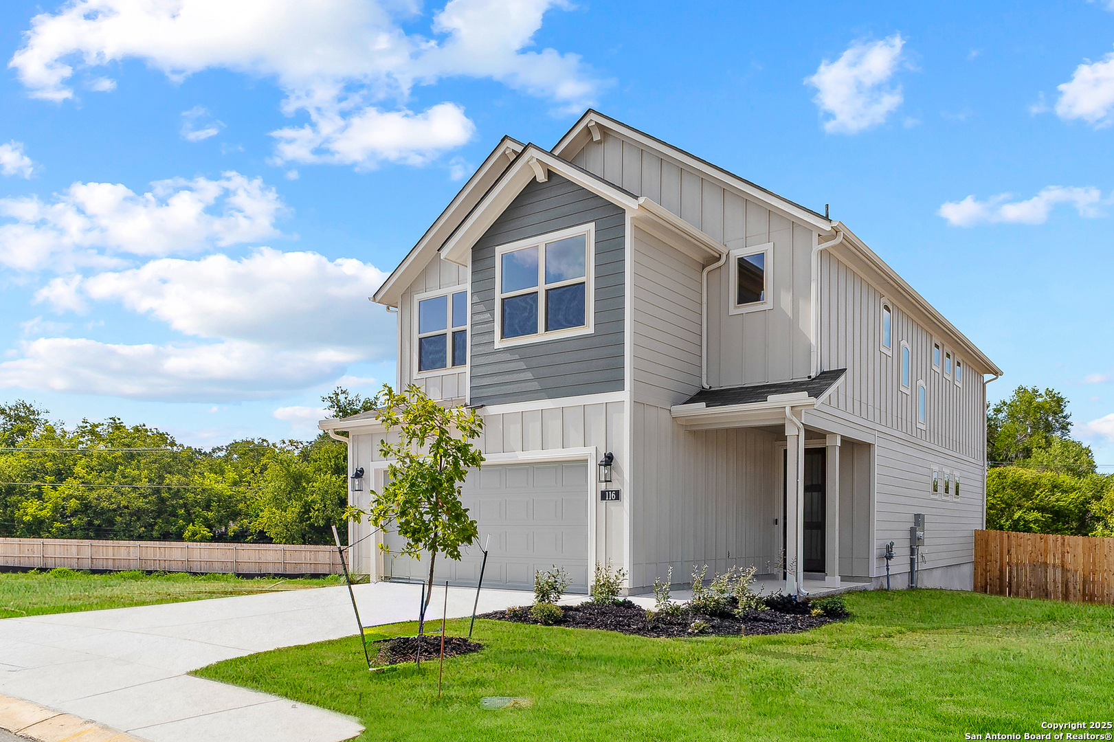 116 Vertex Loop San Antonio, TX 78238 - Photo 2 of 27 a front view of house with yard and green space