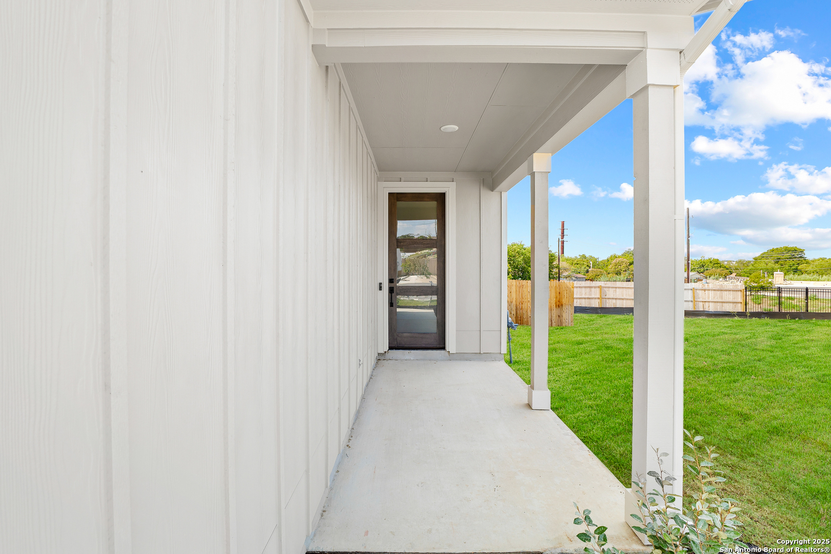116 Vertex Loop San Antonio, TX 78238 - Photo 4 of 27 a view of a porch with a big yard