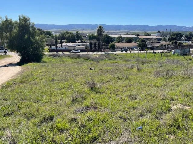 a view of a garden with houses