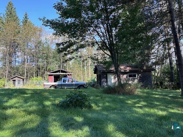 7680 Sauna Road Embarrass, MN 55732 - Photo 17 of 24 View of yard featuring an outdoor structure