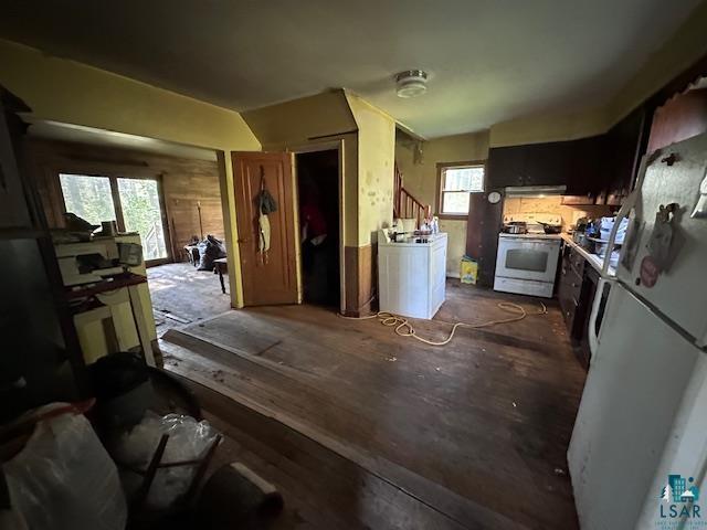 7680 Sauna Road Embarrass, MN 55732 - Photo 3 of 24 Kitchen with white appliances, washer / clothes dryer, and a wealth of natural light