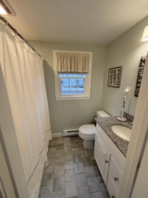 221 Upper County Road, Unit 2A Dennis Port, MA 02639 - Photo 6 of 6 a bathroom with a granite countertop sink toilet and shower