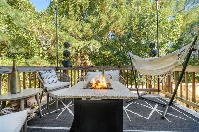 swimming pool view with a seating space