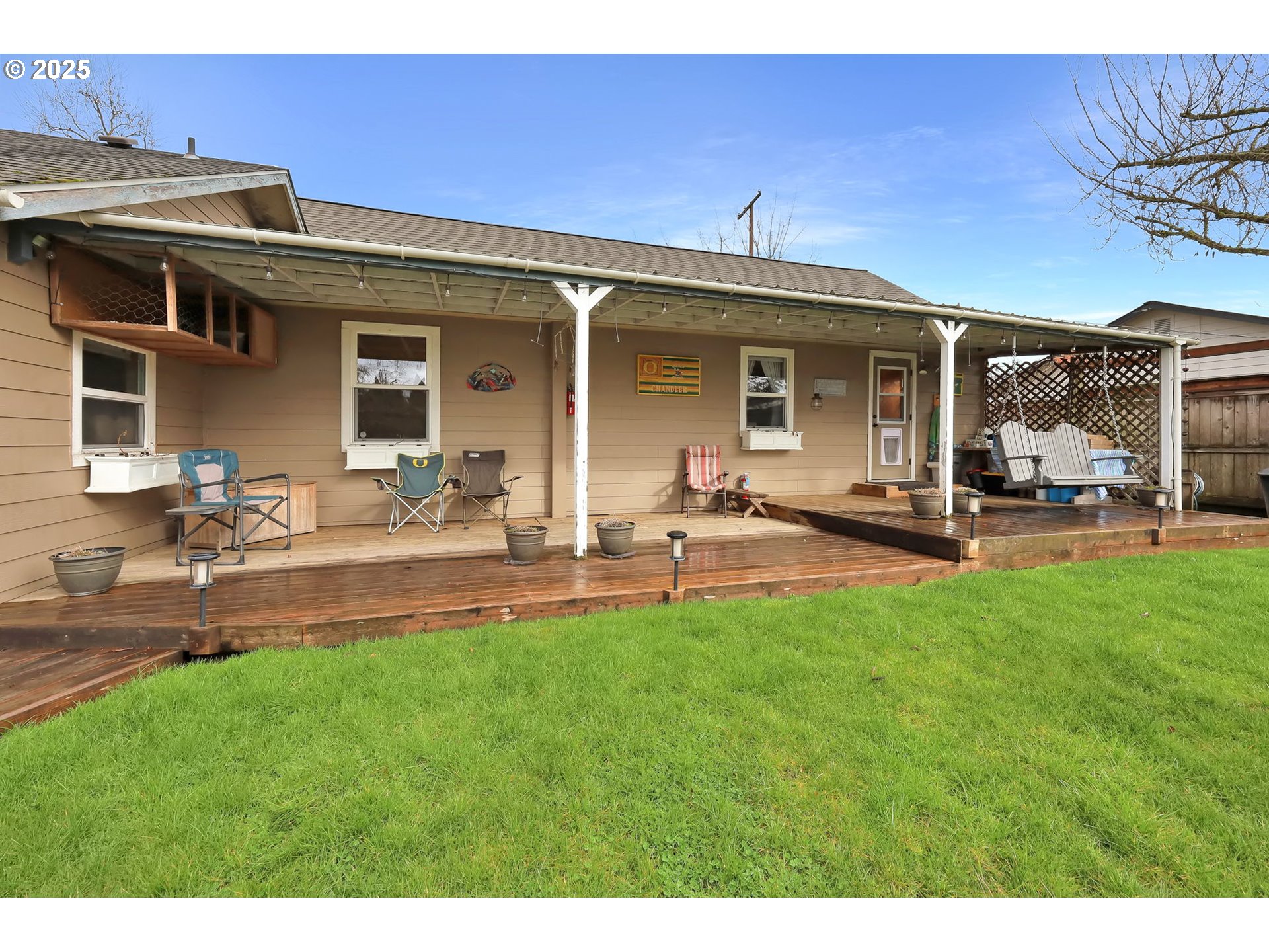 1105 West Fairview Drive Springfield, OR 97477 - Photo 34 of 46 a view of a house with backyard porch and sitting area