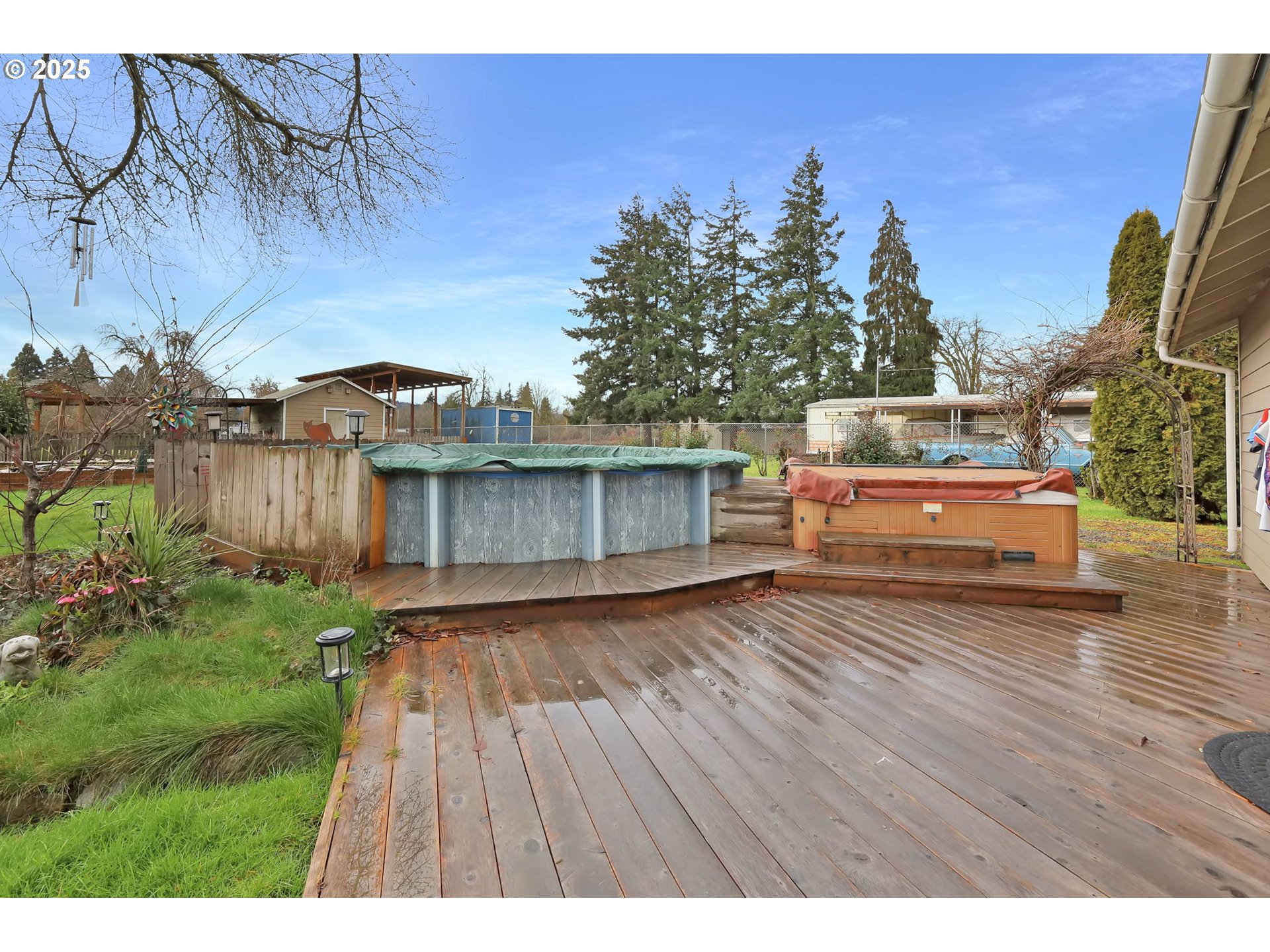 1105 West Fairview Drive Springfield, OR 97477 - Photo 36 of 46 a backyard of a house with wooden floor and fence