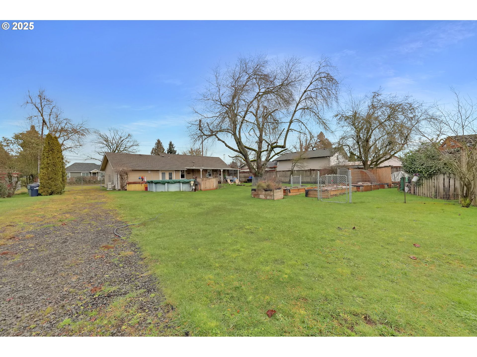 1105 West Fairview Drive Springfield, OR 97477 - Photo 42 of 46 a view of a house with a yard