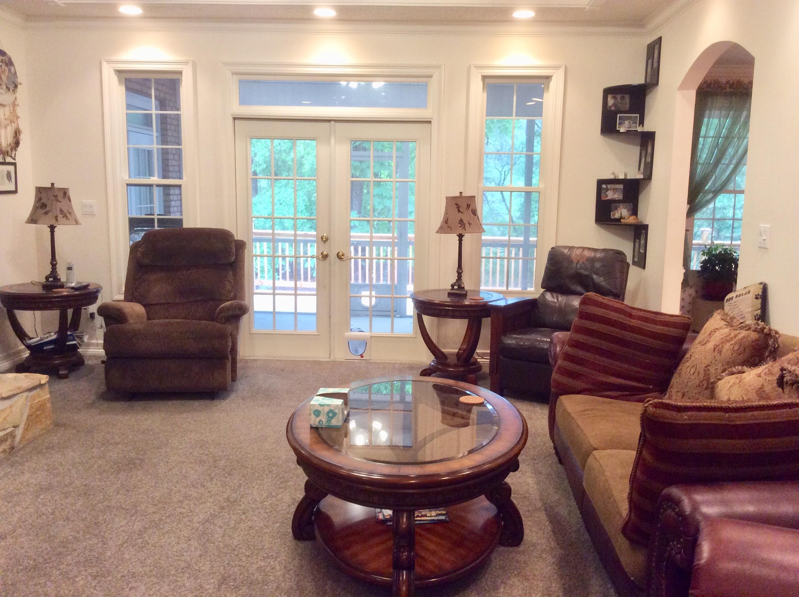 6089 Clear Creek Road Crestview, FL 32539 - Photo 3 of 38 a living room with furniture and a large window