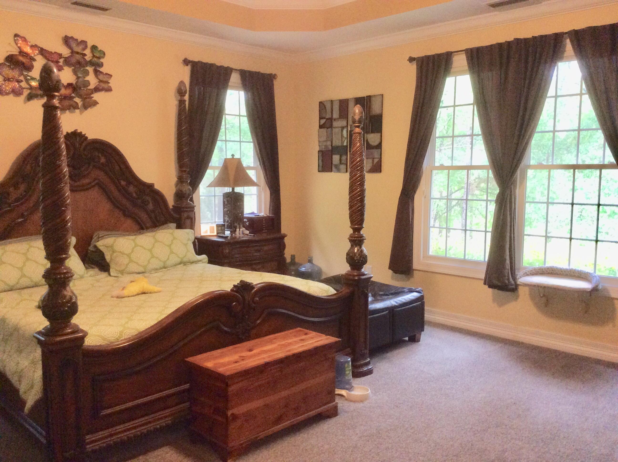 6089 Clear Creek Road Crestview, FL 32539 - Photo 8 of 38 a living room with furniture and a large window