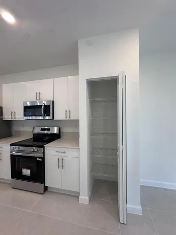 a view of a hall with the couch