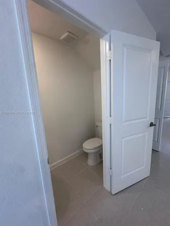 an empty room with a fireplace