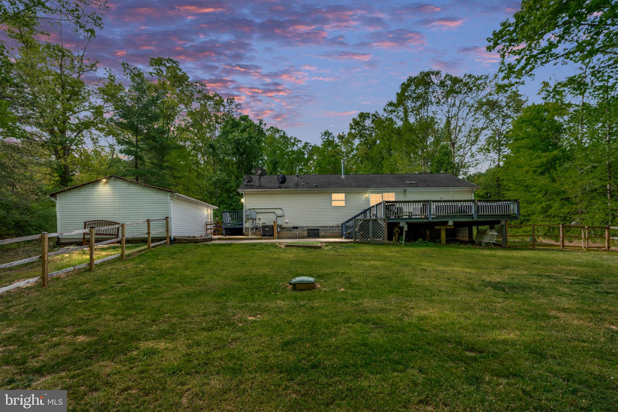 2319 Sizer Road Beaverdam, VA 23015 - Photo 2 of 61 Serene home with lush green surroundings.